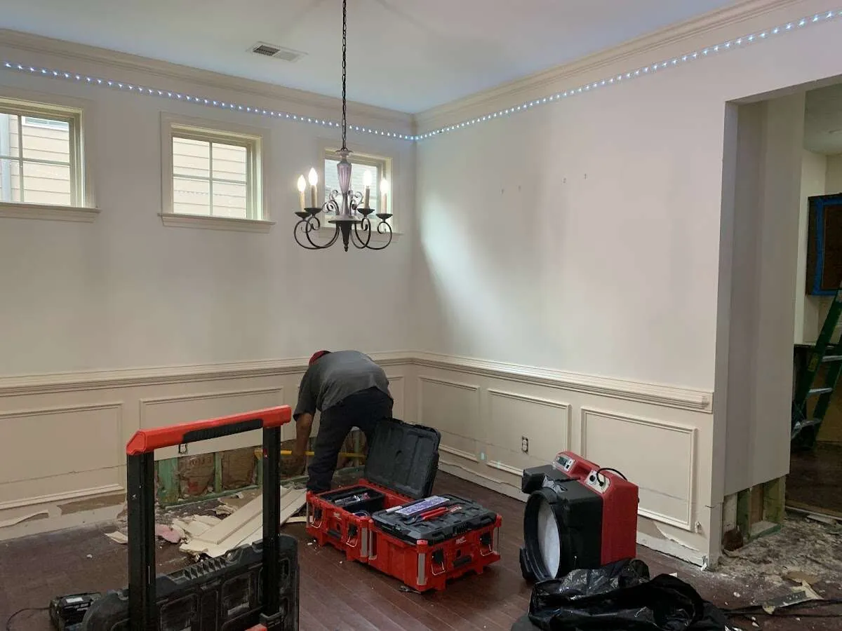 Restoration technician with professional equipment in Metairie